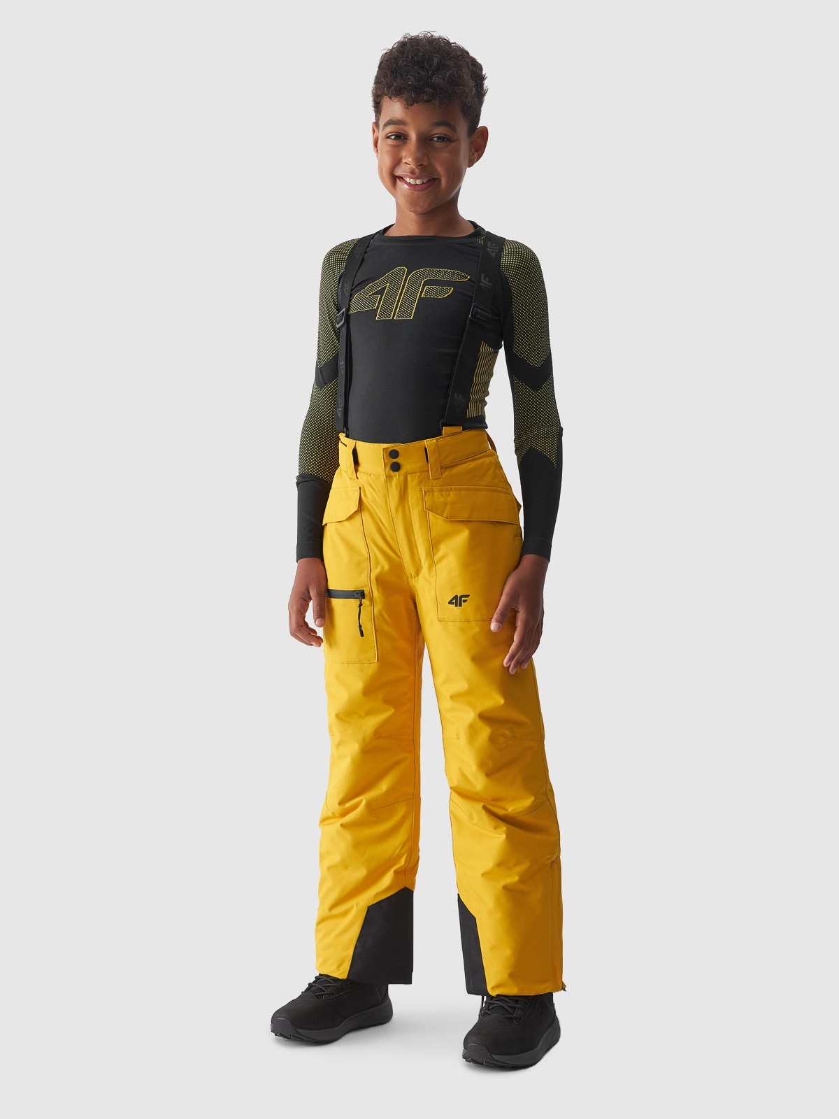 Levně Chlapecké lyžařské kalhoty se šlemi membrána 10000 - žluté