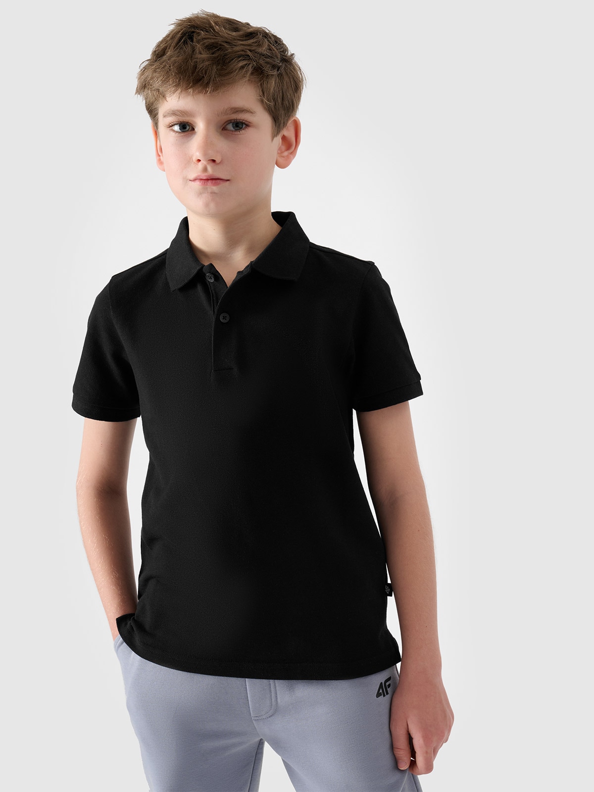 Levně Chlapecké hladké polo tričko regular - černé